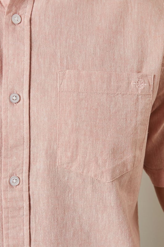 Textured woven fabric with subtle surface interest for added dimension
        Classic button-down collar for a smart-casual finish
        Convenient chest pocket detail for practical styling
        Short sleeves with neat hems perfect for warmer days
        Centre back pleat providing enhanced comfort and movement
    
    This Maine textured short sleeve shirt combines relaxed comfort with understated style. The button-down collar offers a refined touch whilst maintaining a laid-back feel, making it ideal for casual settings. Style as shown with light-coloured chino shorts and white trainers for effortless summer outings, or pair with tailored trousers for garden parties and family gatherings. The textured fabric adds subtle character to your ensemble without overwhelming it. For cooler evenings, layer under a lightweight bomber jacket or cardigan. This versatile shirt transitions seamlessly from daytime casual to evening drinks, making it an essential addition to your warm-weather wardrobe. The relaxed fit ensures all-day comfort whilst maintaining a put-together appearance that works across multiple settings.