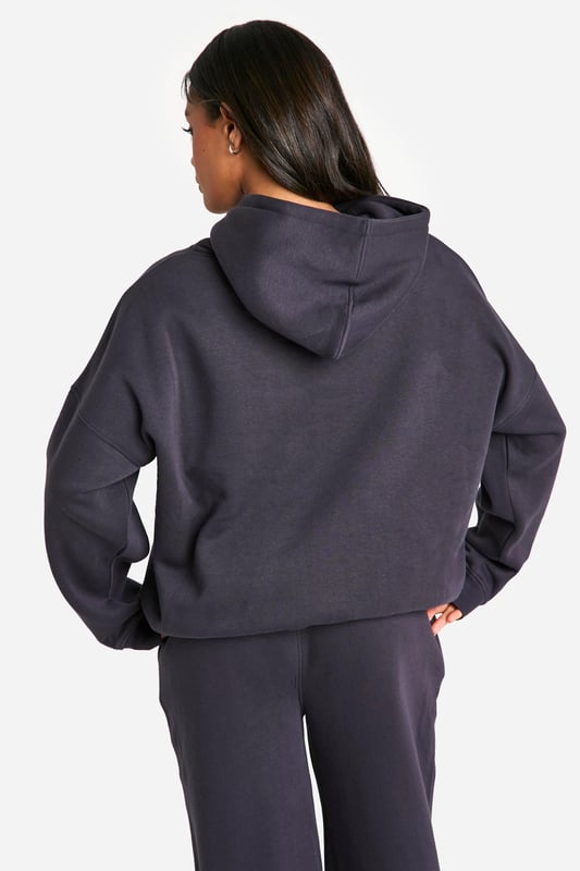 Oversized fit for ultimate comfort and style
        Bold 'Studio' slogan print across the chest
        Spacious hood for added warmth and casual flair
        Convenient front pocket for essentials
        Ribbed cuffs and hem for a snug fit
    
    Make a statement in this trendy oversized hoodie, perfect for those who love to combine comfort with street-style edge. The bold 'Studio' slogan across the chest adds a touch of urban cool to your casual wardrobe. Pair it with wide-leg trousers and trainers for a relaxed weekend look, or throw it over cycling shorts and chunky boots for an edgy athleisure vibe. Ideal for lazy Sundays, coffee runs, or casual meet-ups with friends, this hoodie is versatile enough to take you from daytime errands to evening chill-outs. Layer it over a long-sleeved tee for extra warmth during cooler months, or wear it solo as a comfy throw-on piece. The oversized fit allows for easy movement, making it a go-to choice for your active lifestyle. Whether you're heading to the gym, running errands, or simply lounging at home, this hoodie promises to keep you stylish and cosy all day long.