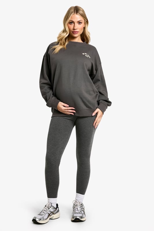 Comfortable maternity hoodie and leggings set
        Relaxed fit hoodie with 'In My Mom Era' slogan
        Stretchy leggings for growing bump
        Versatile for lounging or light exercise
        Soft cotton blend fabric for all-day comfort
    
    Embrace your journey into motherhood with this chic and cosy maternity tracksuit set. The relaxed-fit hoodie features a playful 'In My Mom Era' slogan, perfect for showcasing your new status with pride. Paired with stretchy leggings that accommodate your growing bump, this set offers supreme comfort for your changing body. Whether you're heading to a prenatal yoga class or simply relaxing at home, this versatile ensemble has got you covered. Style it with trendy trainers and a roomy tote for a quick coffee run, or layer with a denim jacket for a casual day out. The soft cotton blend fabric ensures all-day comfort, making this set an essential addition to your maternity wardrobe. It's the ideal choice for the fashion-forward mum-to-be who wants to stay on-trend while prioritising comfort during this special time.