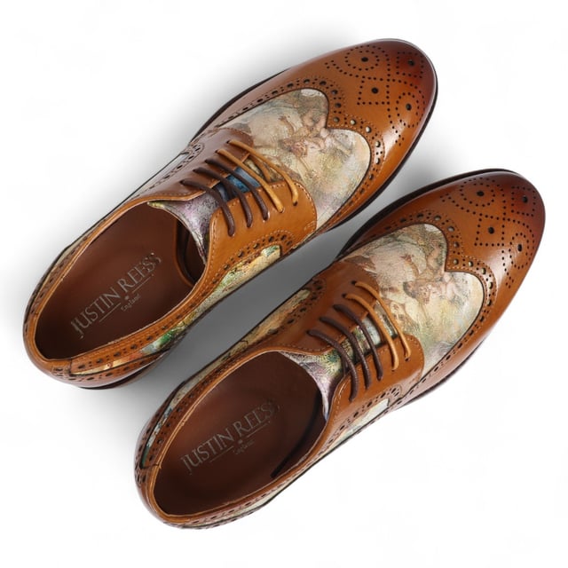 Add a unique touch to your formal wardrobe with the Scott Men's Iconic Print Leather Brogue Shoes. Crafted from 100% premium leather, these brogues combine style, durability, and comfort. Featuring classic brogue detailing with decorative patterns, they bring elegance and sophistication to any look.

Unique Iconic Print for a bold, stylish statement
Premium Leather for durability and luxury
Classic Brogue Detailing for timeless appeal
Lace-Up Design for an adjustable fit