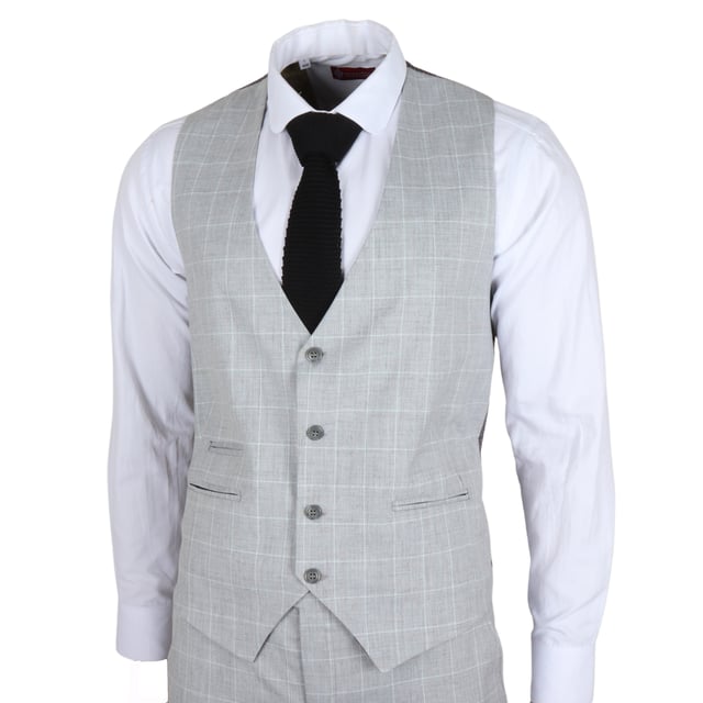 Make a lasting impression with this elegant Grey checked 3-piece suit, designed to bring modern sophistication to any formal occasion. Whether you're attending a wedding, leading a business meeting, or dressing to impress, this suit delivers a tailored fit that enhances your silhouette and boosts your confidence. Crafted from premium quality fabric, it combines durability with all-day comfort. The versatile set includes a blazer, vest, and trousers—perfect for creating classic or contemporary looks.\nElegant GreyChecked Design: Adds a refined touch of modern elegance to your formalwear.\nTailored Fit for a Sharp Look: Provides a sleek, polished silhouette that flatters your frame.\nPremium Quality Fabric: Made from a blend of 80% polyester and 20% viscose for comfort and durability.\nVersatile 3-Piece Set: Includes a blazer, vest, and trousers that can be worn together or styled separately.\nMaterial Composition: 80% Polyester, 20% Viscose.