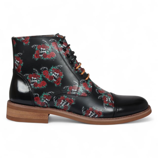 Elevate your style with the Justin Reess Adam Skull Men's Floral Skull Print Leather Oxford Ankle Boots. Crafted from premium leather, these boots showcase a distinctive Floral Skull Print design that adds a bold and fashionable edge. With classic Oxford brogue detailing and a secure lace-up closure, they bring sophistication to both casual and formal outfits. Designed for versatility, they’re perfect for work, social gatherings, and everyday wear. Durable and comfortable, these boots are a standout addition to any wardrobe.

Stylish Floral Skull Print for a unique and eye-catching look
Classic Oxford Brogue Style with lace-up closure
Premium Leather Construction for durability and comfort
Versatile Wear for multiple occasions
