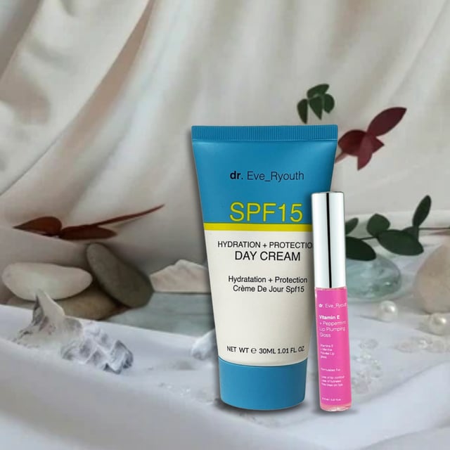 SPF15 Hydration + Protection day cream 30 ml +Vitamin E and Peppermint Lip Plumps 8ml "SPF15 Hydration + Protection day cream 30 ml: Infused with advanced SPF15 protection, this day cream acts as a reliable barrier against UVA and UVB rays, safeguarding your skin from potential sun damage. Its lightweight and non-greasy texture make it an ideal companion for daily use, allowing you to embrace the outdoors with confidence while maintaining a nourished, youthful glow.
Collagen Booster Ultra Concentrated Serum 15ml: Vitamin E and Peppermint Lip Plumps 8ml: Peppermint Lip Plumping Gloss contains lip nourishing and plumping ingredients that aim to make the lips look plumper, more voluminous and youthful looking.
"To use the SPF15 Hydration + Protection Day Cream (30 ml) along with the Vitamin E and Peppermint Lip Plumps (8 ml), start with a clean face. After cleansing, take a small amount of the SPF15 Hydration + Protection Day Cream and apply it evenly to your face and neck using gentle upward strokes. Make sure to cover all areas of your skin for hydration and sun protection.
Next, apply the Vitamin E and Peppermint Lip Plumps to your lips. Squeeze a small amount of the product onto your fingertip or directly onto your lips, then gently massage it in. The lip plump will not only hydrate your lips but also provide a refreshing tingling sensation thanks to the peppermint.
For best results, use this combination in the morning as part of your daily skincare routine. The day cream will keep your skin hydrated and protected from UV rays, while the lip plump will enhance your lips' fullness and hydration throughout the day."
