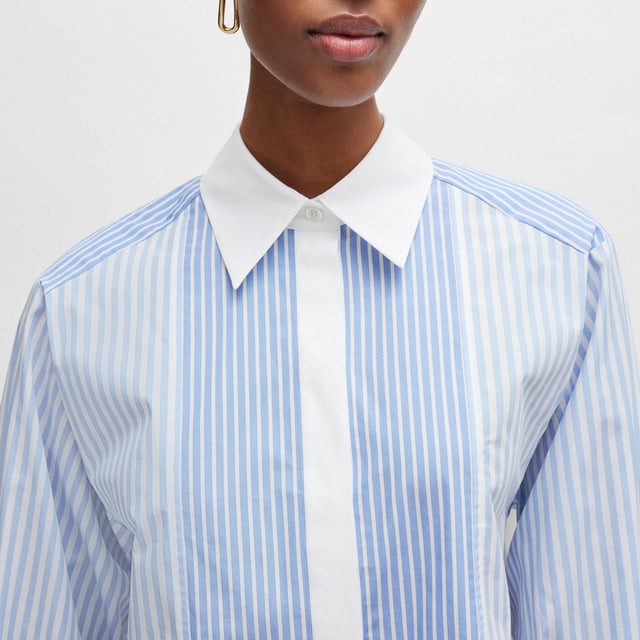 Women's Boss Betallina Pure-Cotton Blouse. Shirt from the BOSS collection made of patterned fabric. Model made of exceptionally comfortable, cotton material.- Loose cut for full freedom of movement.- Button fastening.- Buttoned cuffs.- Model with collar.- Thin, non-elastic fabric. Material: 100% Cotton. Ref: 50511828969.