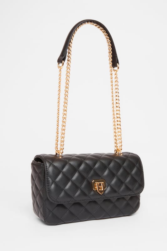 - Faux leather - Quilted design - Cross body style - Chain strap - Excluding trims