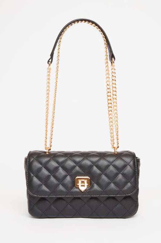 - Faux leather - Quilted design - Cross body style - Chain strap - Excluding trims