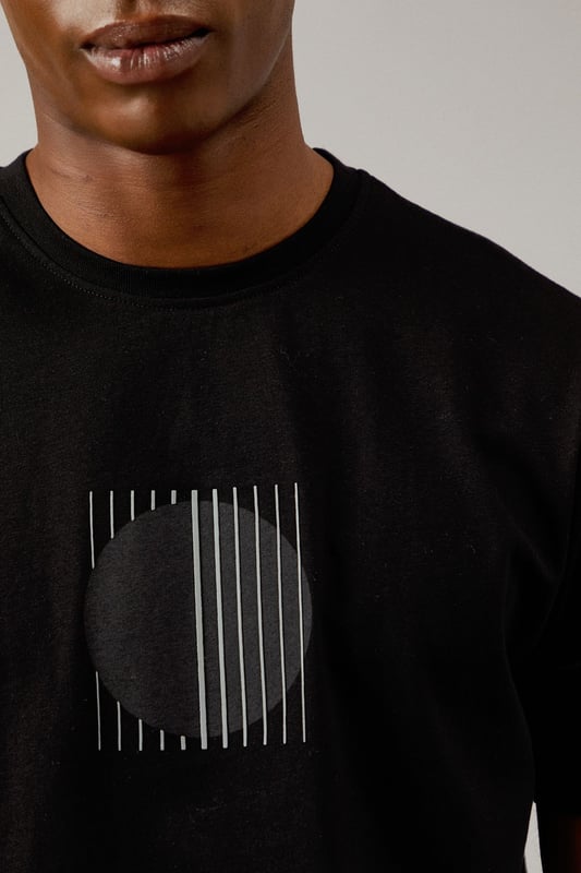 Distinctive eclipse print graphic on the chest for a modern, understated look
        Classic crew neck design offers timeless appeal and everyday comfort
        Short sleeves with clean-finished edges for a neat, polished appearance
        Soft jersey fabric ensures all-day comfort for casual wear
        Versatile regular fit that works well for various body types
    
    This Burton Eclipse Print T-shirt combines simplicity with subtle style, making it a wardrobe essential for the modern man. The minimalist graphic adds interest without overwhelming, perfect for those who appreciate refined details. Style it as shown with olive shorts and trainers for relaxed weekend outings, or pair with dark jeans and a bomber jacket for casual evenings at the pub with mates. The versatile nature of this t-shirt makes it ideal for sporting events, family barbecues, or simply lounging at home. Its clean lines and straightforward design reflect the Burton ethos of practical yet stylish menswear that transitions effortlessly between different casual settings. The cotton jersey fabric ensures breathability and comfort throughout the day, whether you're catching the match or enjoying a countryside walk. A true staple that delivers on both comfort and style.