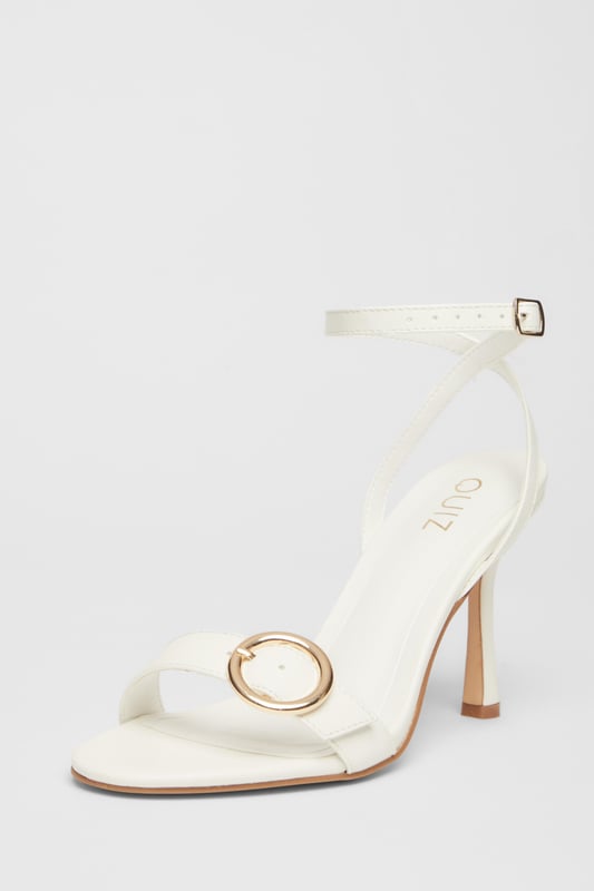 White Buckle Front Heels - Faux leather finish - Flared heel - Buckle detail - Open toe - Ankle strap - Heel height: 9.5 cm/ 3.75 inches