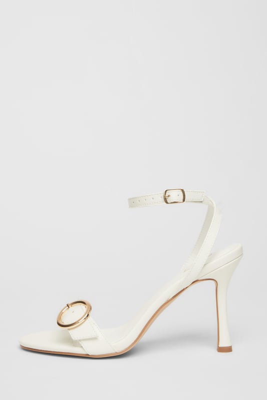 White Buckle Front Heels - Faux leather finish - Flared heel - Buckle detail - Open toe - Ankle strap - Heel height: 9.5 cm/ 3.75 inches