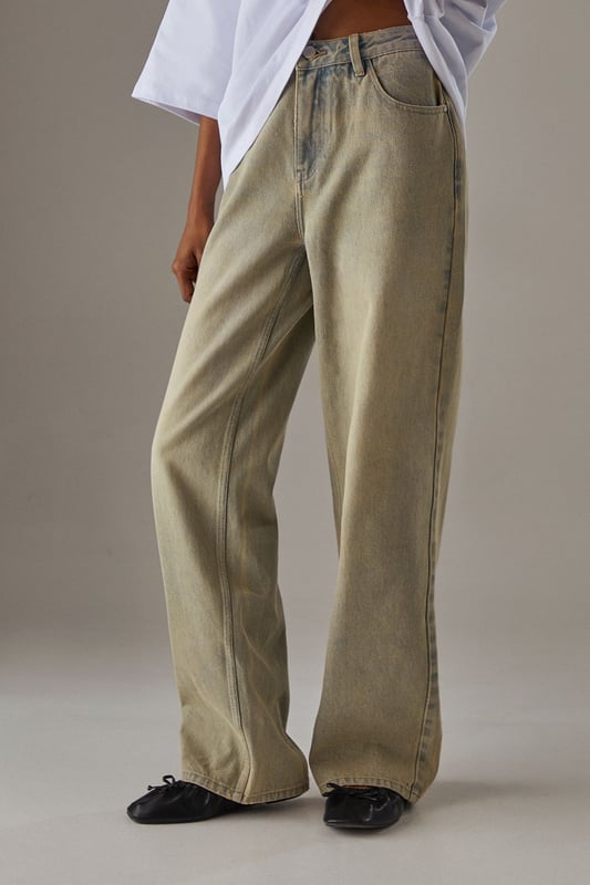 Vintage-inspired boyfriend fit for a relaxed silhouette
        High-rise waist for a flattering and comfortable fit
        Classic five-pocket design for practicality
        Wide leg opening for a trendy, laid-back look
        Distressed wash effect for an authentic, lived-in appearance
    
    Embrace effortless style with these Vintage Wash Ultimate Denim Boyfriend Jeans from Warehouse. Perfect for the confident woman who appreciates edgy yet feminine fashion, these jeans offer a relaxed fit that doesn't compromise on style. The high-rise waist and wide leg opening create a flattering silhouette that pairs beautifully with both casual and dressier tops. For a chic daytime look, team with a crisp white oversized shirt and trainers, as shown. Alternatively, dress them up for an evening out with a silk camisole and heeled mules. The versatile wash makes these jeans ideal for various casual occasions, from weekend brunches to family gatherings. Their relaxed fit ensures all-day comfort without sacrificing that coveted vintage aesthetic, making them a must-have addition to any fashion-forward wardrobe.