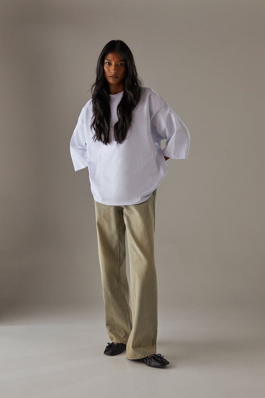 Vintage-inspired boyfriend fit for a relaxed silhouette
        High-rise waist for a flattering and comfortable fit
        Classic five-pocket design for practicality
        Wide leg opening for a trendy, laid-back look
        Distressed wash effect for an authentic, lived-in appearance
    
    Embrace effortless style with these Vintage Wash Ultimate Denim Boyfriend Jeans from Warehouse. Perfect for the confident woman who appreciates edgy yet feminine fashion, these jeans offer a relaxed fit that doesn't compromise on style. The high-rise waist and wide leg opening create a flattering silhouette that pairs beautifully with both casual and dressier tops. For a chic daytime look, team with a crisp white oversized shirt and trainers, as shown. Alternatively, dress them up for an evening out with a silk camisole and heeled mules. The versatile wash makes these jeans ideal for various casual occasions, from weekend brunches to family gatherings. Their relaxed fit ensures all-day comfort without sacrificing that coveted vintage aesthetic, making them a must-have addition to any fashion-forward wardrobe.
