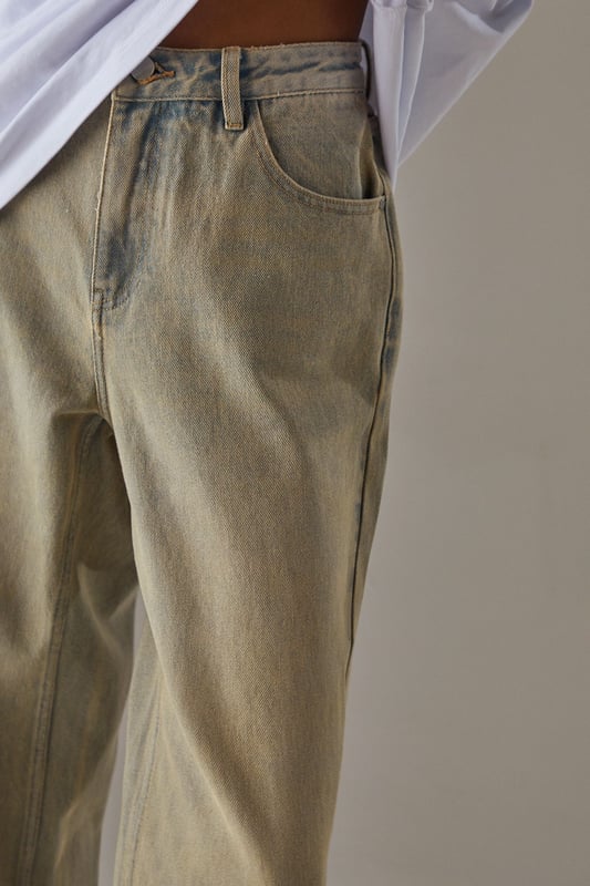 Vintage-inspired boyfriend fit for a relaxed silhouette
        High-rise waist for a flattering and comfortable fit
        Classic five-pocket design for practicality
        Wide leg opening for a trendy, laid-back look
        Distressed wash effect for an authentic, lived-in appearance
    
    Embrace effortless style with these Vintage Wash Ultimate Denim Boyfriend Jeans from Warehouse. Perfect for the confident woman who appreciates edgy yet feminine fashion, these jeans offer a relaxed fit that doesn't compromise on style. The high-rise waist and wide leg opening create a flattering silhouette that pairs beautifully with both casual and dressier tops. For a chic daytime look, team with a crisp white oversized shirt and trainers, as shown. Alternatively, dress them up for an evening out with a silk camisole and heeled mules. The versatile wash makes these jeans ideal for various casual occasions, from weekend brunches to family gatherings. Their relaxed fit ensures all-day comfort without sacrificing that coveted vintage aesthetic, making them a must-have addition to any fashion-forward wardrobe.