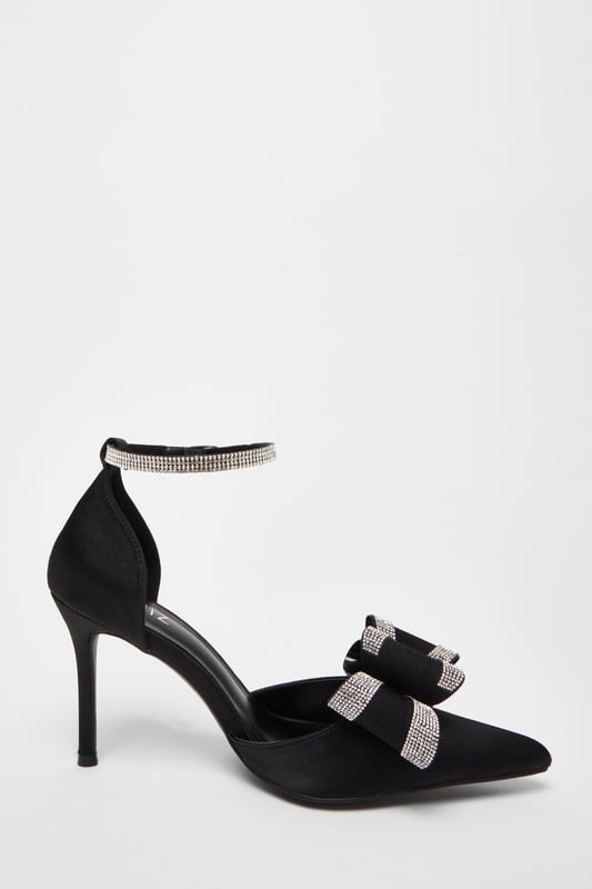 - Satin finish - Ankle strap - Embellished detail - Bow detail - Pointed toe - Court style - Heel height: 9 cm / 3.6" approx