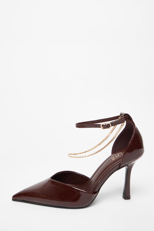 - Faux leather - Patent finish - Chain detail - Pointed toe - Court style - Heel height: 9.5 cm/3.75 inches approx