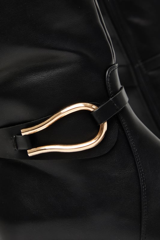 - Faux leather - Knee high - Buckle detail - Inner zip closure
