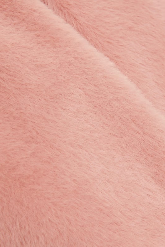 - Faux fur - Cropped fit - Long sleeves - Cape style - Hook and eye closure