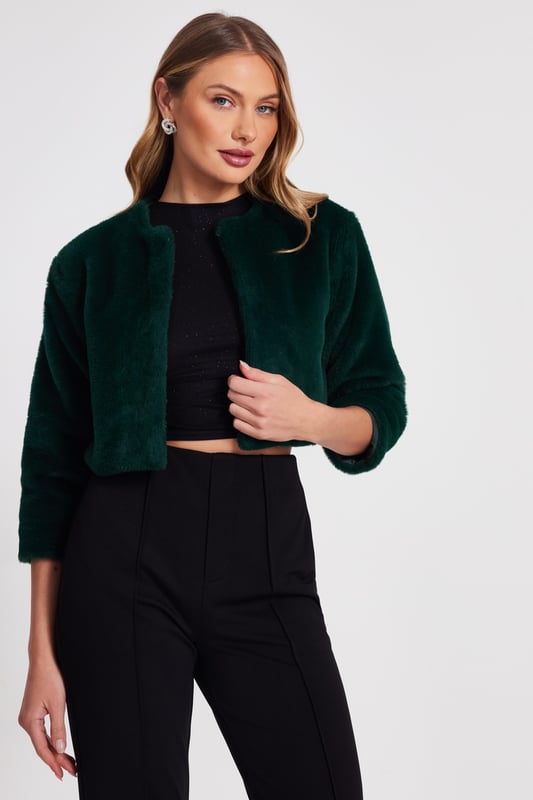 - Faux fur finish - Cropped sleeves - Hook and eye closure - Cropped fit - Cape style - Always check the wash care label - Cool hand wash with mild detergent
