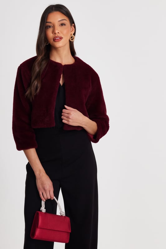 - Faux fur finish - Cropped sleeves - Hook and eye closure - Cropped fit - Cape style - Always check the wash care label - Cool hand wash with mild detergent
