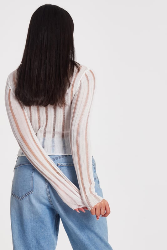 - Knitted finish - Round neckline - Diamante detail - Long sleeves - Model height: 5'9" - Model wears uk 8 / us 4 / eur 36 - Always check the wash care label - Cool hand wash with mild detergent