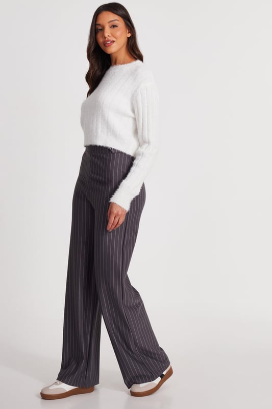 - Knitted finish - Cropped style - Long sleeves - Model height: 5' 8 " - Model wears uk 8 / us 4 / eur 36 - Always check the care wash label - Cool hand wash with mild detergent