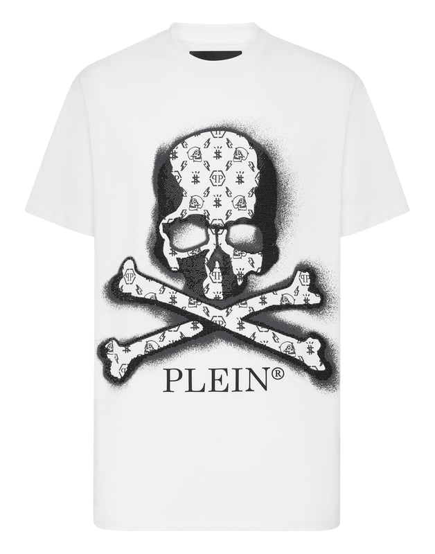 Camiseta de punto de algodón presenta el estampado en los cristales de strass de la calavera icónica. Tira para colgar metálica  con logotipo está cosido en el canesú. Pespunte doble.