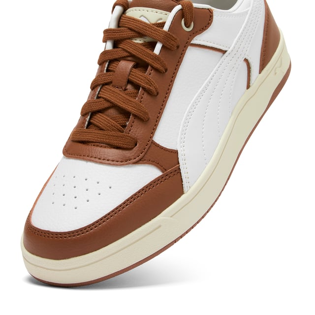 PRODUCT STORY: Sport-inspired shoes for life on the go. The PUMA Dribble SD sneakers blend sleek style and everyday comfort so you can focus on the important things.DETAILS: Regular fit; Mid boot; Rubber outsole; Lace closure; PUMA branding details.
