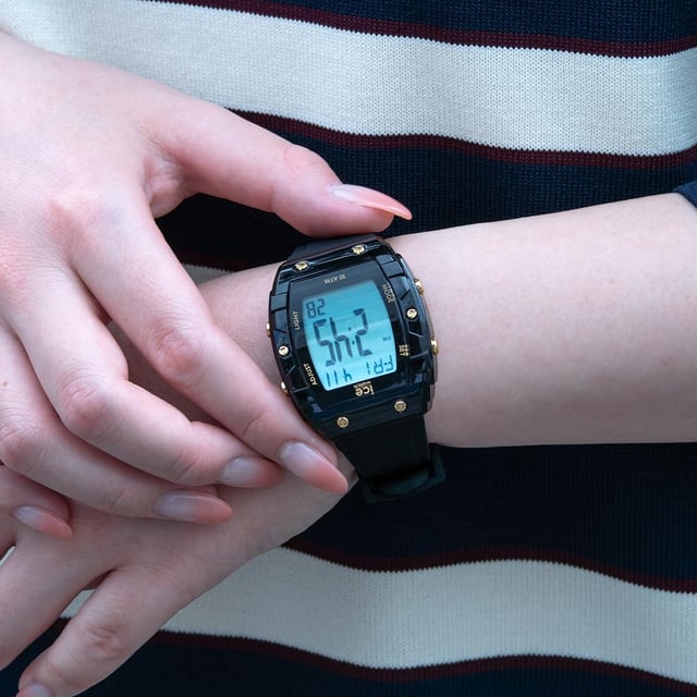 Ice Watch Ice Digit Boliday - Black Unisex's Black Watch 024564 This Ice Watch Ice Digit Boliday - Black Digital Watch for Unisex is the perfect timepiece to wear or to gift. It's Black Tonneau case combined with the comfortable Black Silicone watch band will ensure you enjoy this stunning timepiece without any compromise. Operated by a high quality Quartz movement and water resistant to 5 bars, your watch will keep ticking. Adopt a sleek, futuristic style with the ICE digit boliday. This digital watch is not just a watch, but an accessory that combines modernity and sophistication. This Digital watch has a calendar function: Day-Date as well as a Stop Watch , Countdown , Alarm and Light High quality Black Silicone strap with a secure Buckle, measuring 20 cm in length and 21 mm in width Case measurement: 37 X 44 mm,case thickness: 12 mm, case colour: Black and dial colour: LCD