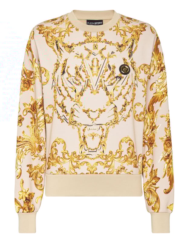 Este polar de cuello redondo es ideal para la sesión de calentamiento de cualquier actividad. Ligero, cómodo y suave.   Forro polar de algodón con forro de gasa.    Tejido con estampado barroco   Estampado de la marca en la espalda   Parche engomado de tigre cosido en el pecho izquierdo   Dobladillos de punto elástico   Ajuste: Cropped