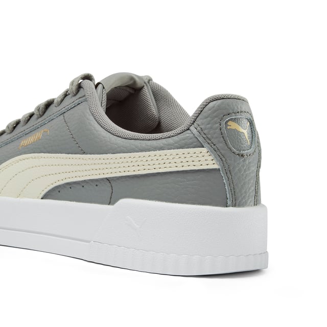 PRODUCT STORY: Elevate your sneaker game with the PUMA Carina Lux L women's trainers. Crafted from high-quality leather, these stylish sneakers offer both fashion and function. The sleek design and comfortable fit make them the perfect choice for everyday wear, while the durable construction ensures long-lasting performance. Step out in style and comfort with the PUMA Carina Lux L trainers - a must-have addition to any fashion-forward wardrobe.
