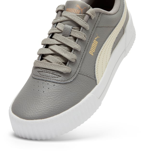 PRODUCT STORY: Elevate your sneaker game with the PUMA Carina Lux L women's trainers. Crafted from high-quality leather, these stylish sneakers offer both fashion and function. The sleek design and comfortable fit make them the perfect choice for everyday wear, while the durable construction ensures long-lasting performance. Step out in style and comfort with the PUMA Carina Lux L trainers - a must-have addition to any fashion-forward wardrobe.