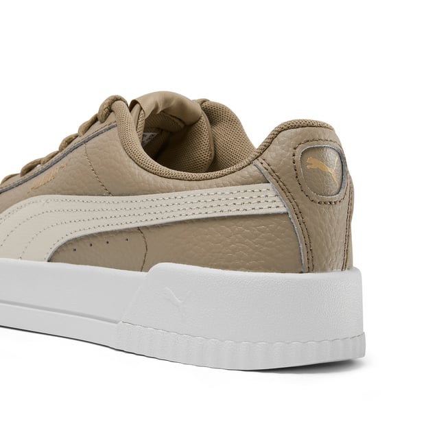 PRODUCT STORY: Elevate your sneaker game with the PUMA Carina Lux L women's trainers. Crafted from high-quality leather, these stylish sneakers offer both fashion and function. The sleek design and comfortable fit make them the perfect choice for everyday wear, while the durable construction ensures long-lasting performance. Step out in style and comfort with the PUMA Carina Lux L trainers - a must-have addition to any fashion-forward wardrobe.