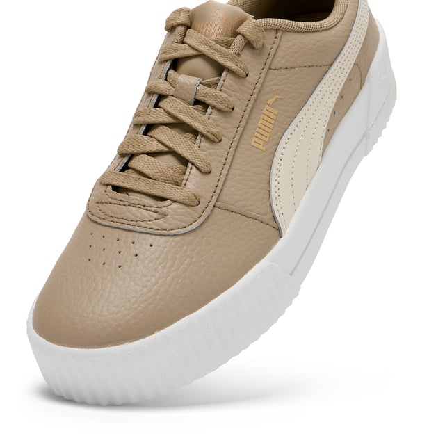 PRODUCT STORY: Elevate your sneaker game with the PUMA Carina Lux L women's trainers. Crafted from high-quality leather, these stylish sneakers offer both fashion and function. The sleek design and comfortable fit make them the perfect choice for everyday wear, while the durable construction ensures long-lasting performance. Step out in style and comfort with the PUMA Carina Lux L trainers - a must-have addition to any fashion-forward wardrobe.
