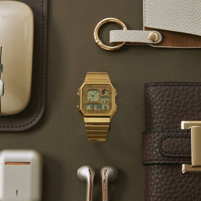 This Casio Casio Collection Vintage Digital Watch for Unisex is the perfect timepiece to wear or to gift. It's Gold  Rectangular case combined with the comfortable Gold Stainless steel watch band will ensure you enjoy this stunning timepiece without any compromise. Operated by a high quality Quartz movement and water resistant to 3 bars, your watch will keep ticking. A digital watch featuring an analog-style clock display all wrapped up in the gadgety look you love.   A retro-futuristic face is combined with stylish metallic colors and effective accent colors, showcasing a passion for gadgets. This Digital watch has a Calendar function: Day-Date as well as Stop Watch , Countdown , Worldtime , Alarm and Light High quality 20 cm length and 20 mm width Gold Stainless steel strap with a Folding Clasp Case measurement: 35 X 40 mm,case thickness: 9 mm, case colour: Gold and dial colour: Gold