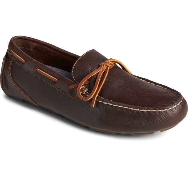 Show off your sense of style with our Davenport 1-Eye driving shoe. Crafted from pure premium leather, with luxurious rawhide laces and meticulous moccasin stitching, these tasteful loafers sit atop a slim podded rubber outsole.