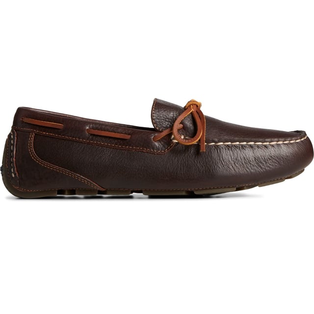 Show off your sense of style with our Davenport 1-Eye driving shoe. Crafted from pure premium leather, with luxurious rawhide laces and meticulous moccasin stitching, these tasteful loafers sit atop a slim podded rubber outsole.