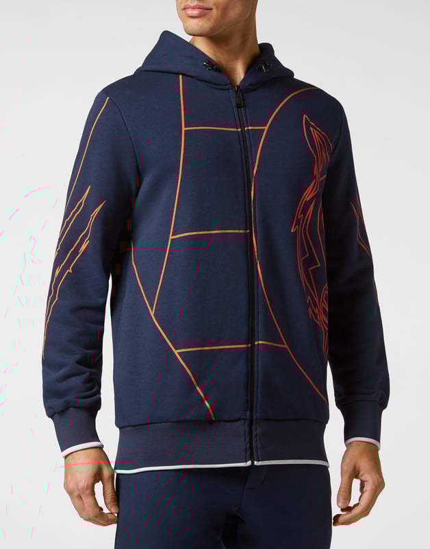 Hier ist dein neuer Trainingsanzug, perfekt für dein Training und auch für deine Freizeit.   Fleece aus Baumwollmischung mit Gazefutter    Markengrafik    Schriftzugdruck auf dem Rücken   Zwei Eingrifftaschen auf der Sweatjacke mit Reißverschluss    Bund mit Nyloneinsätzen und Kordelzug   Zwei Eingrifftaschen   Rippstrickbündchen