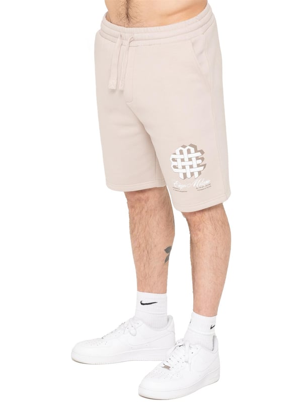 Stay comfortable and stylish with the Enzo Milano Men's Printed Shorts. Featuring a regular fit with soft fleece lining, these shorts are perfect for casual days or relaxed weekends. The elasticated waistband with an adjustable drawstring offers a secure, personalized fit, while two convenient slash pockets provide space for essentials. A bold puff print graphic on the leg adds a standout touch to this everyday staple.(43)