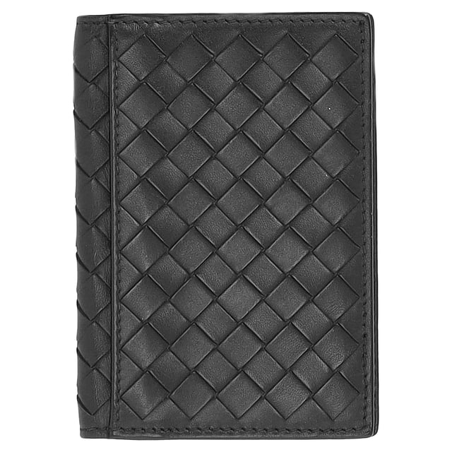 VINTAGE, RRP AS NEW
The Bottega Veneta Intrecciato Card Holder in brown leather showcases the brand’s iconic woven craftsmanship in a sleek, compact design. Made from premium leather, it offers refined durability with multiple slots to keep essentials organized in style. Elegant and timeless, this card holder is a discreet statement of luxury for everyday use.

Bottega Veneta Intreciatto Card Holder in Brown Leather

Condition: Excellent
Signs of wear: No retail tag, No visible sign of wear., 
Packaging: None
Color: Brown | ochre
Material: Leather | leather
Size: One Size | One Size
Measurements: Length: 110
SKU: MRPPUDESM476989M