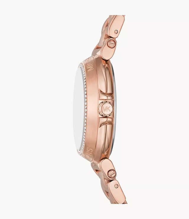 This Michael Kors Maren Analogue Watch for Women is the perfect timepiece to wear or to gift. It's Rose Gold 33 mm Round case combined with the comfortable Rose Gold Stainless steel watch band will ensure you enjoy this stunning timepiece without any compromise. Operated by a high quality Quartz movement and water resistant to 5 bars, your watch will keep ticking. Classic and charming watch perfect for every lady who likes to be the centre of attention.  This Analogue watch has a  function: Luminous Hands and Luminous Numbers High quality 19 cm length and 15 mm width Rose Gold Stainless steell strap with a Fold over with push button clasp Case diameter: 33 mm,case thickness: 9 mm, case colour: Rose Gold and dial colour: Rose gold