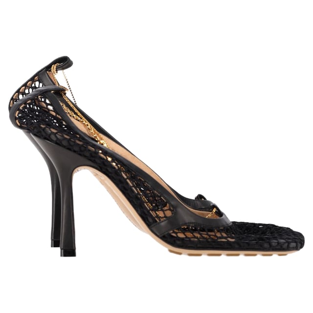 VINTAGE, RRP AS NEW
The Bottega Veneta Stretch Pumps in Black Mesh and Leather seamlessly blend high-fashion design with exceptional comfort. Featuring a sleek, form-fitting silhouette, these pumps contour perfectly to the foot, offering both elegance and ease with every step. Crafted from a sophisticated combination of black mesh and leather, they add a modern edge to any outfit while exuding the brand's signature luxury craftsmanship.

Bottega Veneta Stretch Pumps in Black Mesh and Leather

Condition: Excellent
Signs of wear: Include Box., No visible sign of wear. No Mark at insole.,  Very light mark at soles.
Packaging: Box, Dust bag
Color: Black
Material: Polyester
Size: IT | 36.5
Measurements: Heel height: 85; Insole length: 270
SKU: NAPPUGBSH475627W