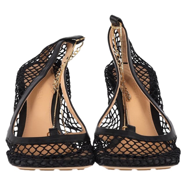 VINTAGE, RRP AS NEW
The Bottega Veneta Stretch Pumps in Black Mesh and Leather seamlessly blend high-fashion design with exceptional comfort. Featuring a sleek, form-fitting silhouette, these pumps contour perfectly to the foot, offering both elegance and ease with every step. Crafted from a sophisticated combination of black mesh and leather, they add a modern edge to any outfit while exuding the brand's signature luxury craftsmanship.

Bottega Veneta Stretch Pumps in Black Mesh and Leather

Condition: Excellent
Signs of wear: Include Box., No visible sign of wear. No Mark at insole.,  Very light mark at soles.
Packaging: Box, Dust bag
Color: Black
Material: Polyester
Size: IT | 36.5
Measurements: Heel height: 85; Insole length: 270
SKU: NAPPUGBSH475627W