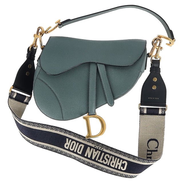 VINTAGE, RRP AS NEW
Maria Grazia Chiuri brings a fresh perspective to the legendary Dior Saddle Bag with this stunning update, crafted in luxurious blue calfskin. The unmistakable Saddle flap features a D stirrup strap with a magnetic pull closure, while antique gold-finish CD signatures on either side of the top handle add a refined touch. With a logo detailed, adjustable, and removable shoulder strap, this versatile bag can be carried by hand, worn over the shoulder, or styled crossbody. Inside, you’ll find a spacious interior pocket and a convenient back pocket, offering both elegance and practicality.


Dior Saddle Bag in Blue Leather
Condition: Excellent
Signs of wear: No retail tag, No visible sign of wear., 
Packaging: None
Color: blue
Material: Leather | leather
Size: One Size | One Size
Measurements: Width: 60; Height: 190; Length: 240; Handle drop: 200; Strap length: 600
SKU: NAPPUGBBA468291W
