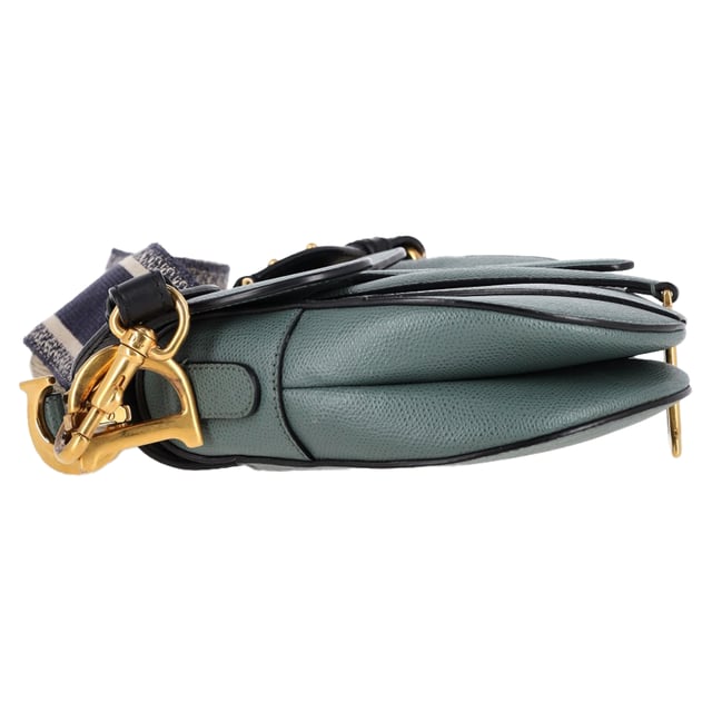 VINTAGE, RRP AS NEW
Maria Grazia Chiuri brings a fresh perspective to the legendary Dior Saddle Bag with this stunning update, crafted in luxurious blue calfskin. The unmistakable Saddle flap features a D stirrup strap with a magnetic pull closure, while antique gold-finish CD signatures on either side of the top handle add a refined touch. With a logo detailed, adjustable, and removable shoulder strap, this versatile bag can be carried by hand, worn over the shoulder, or styled crossbody. Inside, you’ll find a spacious interior pocket and a convenient back pocket, offering both elegance and practicality.


Dior Saddle Bag in Blue Leather
Condition: Excellent
Signs of wear: No retail tag, No visible sign of wear., 
Packaging: None
Color: blue
Material: Leather | leather
Size: One Size | One Size
Measurements: Width: 60; Height: 190; Length: 240; Handle drop: 200; Strap length: 600
SKU: NAPPUGBBA468291W