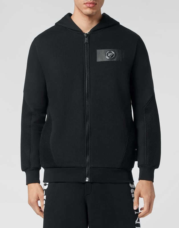 Maximize your training outcomes with this sweatjacket designed to push your limits.   Stretch cotton fleece   Mesh details   Logoed patch on thermo-sealed strap at left chest   Lined hood   Brand print on the back   Zip fastener   Two slit pockets   Rib knit hems