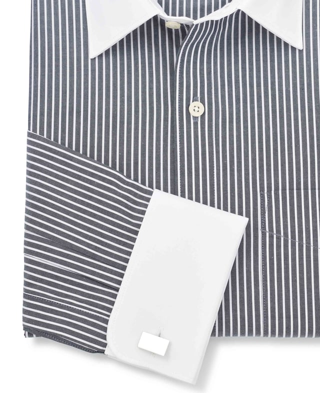 Black and white striped formal shirt with contrast white collar and cuffs. Crafted from the smoothest cotton and cut to our spacious classic fit. Contrast white curl resistant Windsor collar, with an integral and removable collar stay. 100% BCI cotton poplin; smooth to the touch. Generously proportioned classic fit. Curl resistant Windsor contrast white collar and double cuffs. Split yoke, long tails, chest pocket. Machine washable at 40°C. Shirt is presented in fully recyclable packaging.