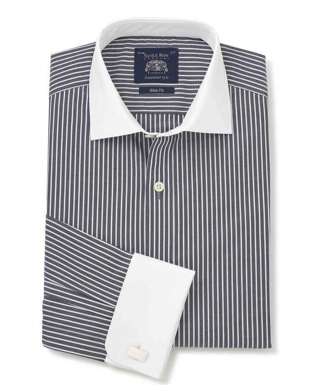 Whether you're taking a client for lunch or celebrating a family wedding, our contrast collar shirts will help you make a stylish impression. This version comes in a navy stripe design in a slim fit shape that flatters all builds. Wear it with a blue suit and your favourite pair of cufflinks. 100% BCI smooth cotton poplin; silk protein easy-care finish. A flattering, gently tapered fit for all builds. Curl resistant cutaway collar, with an integral and removable collar stay. Pucker-free french taped armhole seams. Contrast white double cuff and collar. Split yoke, two back darts. Machine washable at 40°C. Presented in fully recyclable packaging.