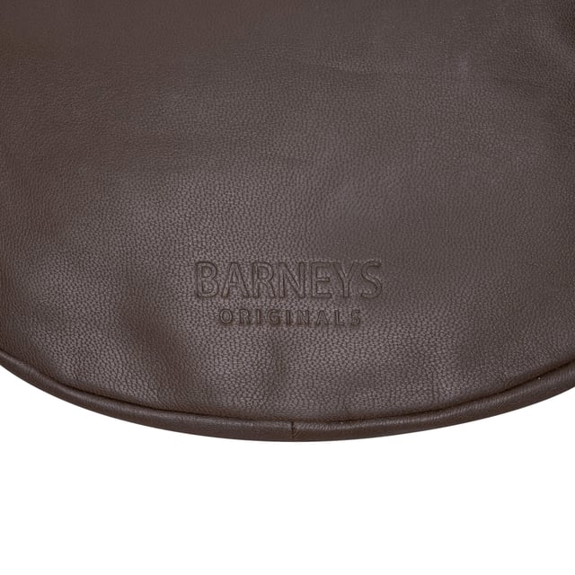 Everyday style with this beautifully crafted cross body bag in rich ruby chocolate brown. Made from supple real goat leather, this bag features a secure zip closure and an adjustable strap for a comfortable, custom fit. Compact and stylish, it’s perfect for carrying your daily essentials with ease and sophistication.