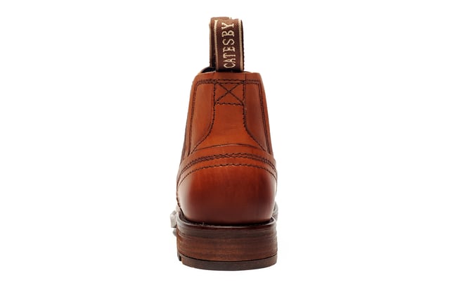 Catesby England was founded in 1970 with a vision and dedication focused on quality, craftsmanship, and a fine attention to detail. From its modest beginnings in a countryside workshop, Catesby England grew into a name synonymous with classic English footwear, blending heritage with modern craftsmanship, manufactured from the finest leathers to ensure durability, comfort, and effortless style.
 The SE Catesby Ryburn Mens Dealer Boots offer a sophisticated yet versatile design, making them ideal for both casual and semi-formal occasions. Expertly crafted from premium high end leather, these boots blend timeless style with modern functionality.
 Designed for convenience and comfort, they feature elastic side panels for a snug, flexible fit, while dual pull-on loops ensure easy on-and-off wear. The durable rubber outsole provides excellent traction and stability, keeping you comfortable and confident throughout the day.
 Perfect for the modern man who values both elegance and practicality, the SE Ryburn Leather Boots are a stylish go-towhether you're heading to the office, stepping out for the weekend, or simply elevating your everyday look.
 - Premium leather boots
 - Elasticated side gussets
 - Slip on design 
 - Dual pull on loops
 - Cushioned insole
 - Highly durable outsole
 - Catesby branding
 
 Please Note: There may be a sticky effect around the welt of the shoe which will wipe clean with a finger or smooth damp cloth. This is nothing more than residue which has been caused by humidity or storage during transportation.
