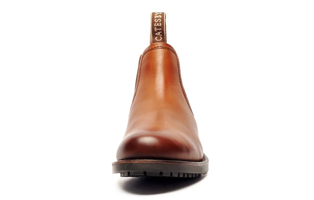 Catesby England was founded in 1970 with a vision and dedication focused on quality, craftsmanship, and a fine attention to detail. From its modest beginnings in a countryside workshop, Catesby England grew into a name synonymous with classic English footwear, blending heritage with modern craftsmanship, manufactured from the finest leathers to ensure durability, comfort, and effortless style.
 The SE Catesby Ryburn Mens Dealer Boots offer a sophisticated yet versatile design, making them ideal for both casual and semi-formal occasions. Expertly crafted from premium high end leather, these boots blend timeless style with modern functionality.
 Designed for convenience and comfort, they feature elastic side panels for a snug, flexible fit, while dual pull-on loops ensure easy on-and-off wear. The durable rubber outsole provides excellent traction and stability, keeping you comfortable and confident throughout the day.
 Perfect for the modern man who values both elegance and practicality, the SE Ryburn Leather Boots are a stylish go-towhether you're heading to the office, stepping out for the weekend, or simply elevating your everyday look.
 - Premium leather boots
 - Elasticated side gussets
 - Slip on design 
 - Dual pull on loops
 - Cushioned insole
 - Highly durable outsole
 - Catesby branding
 
 Please Note: There may be a sticky effect around the welt of the shoe which will wipe clean with a finger or smooth damp cloth. This is nothing more than residue which has been caused by humidity or storage during transportation.