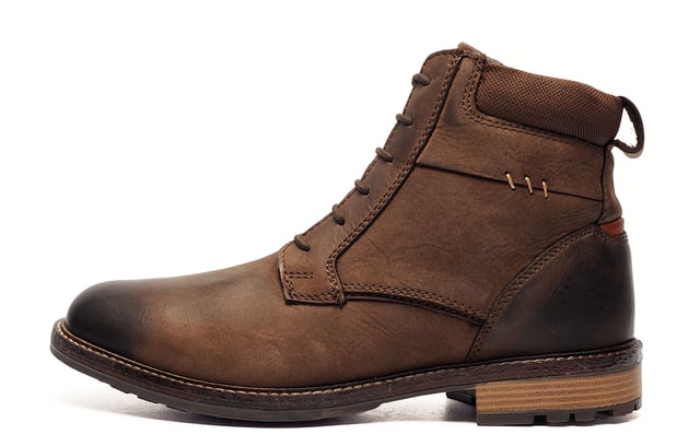 Catesby England was founded in 1970 with a vision and dedication focused on quality, craftsmanship, and a fine attention to detail. From its modest beginnings in a countryside workshop, Catesby England grew into a name synonymous with classic English footwear, blending heritage with modern craftsmanship, manufactured from the finest leathers to ensure durability, comfort, and effortless style.
 Step up your footwear game with the Wilton Men's Catesby Ankle Boots. Crafted with a premium leather upper, these boots are built to last while offering a sleek, sophisticated look. The secure lace-up fastening ensures a snug fit, while the padded ankle collar provides exceptional comfort for all-day wear.
 Intricate stitch detailing adds a touch of elegance, making these boots a standout piece in any wardrobe. The heel pull tab allows for easy on and off, perfect for those on the go. Designed with a durable, rugged outsole, these boots provide excellent traction and stability on a variety of surfaces, making them ideal for both casual and outdoor adventures.
 - Premium Leather Upper
 - Secure Lace-Up Fastening
 - Padded Ankle Collar
 - Intricate Stitch Detailing
 - Soft textile lining
 - Heel Pull Tab
 - Durable Rugged Outsole
 - Catesby branding
 PLEASE NOTE: There is some slight sticky substance around the sole which has been caused by humidity during transportation. This is nothing to worry about and is not a manufacturing fault, you can wipe any excess residue from the shoe with your finger or a smooth damp / wet cloth, preferably one with no fibres showing
